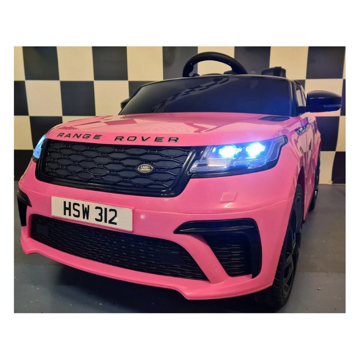 Coche eléctrico infantil Range Rover Velar con un diseño moderno de acabado rosa Cars4Kids