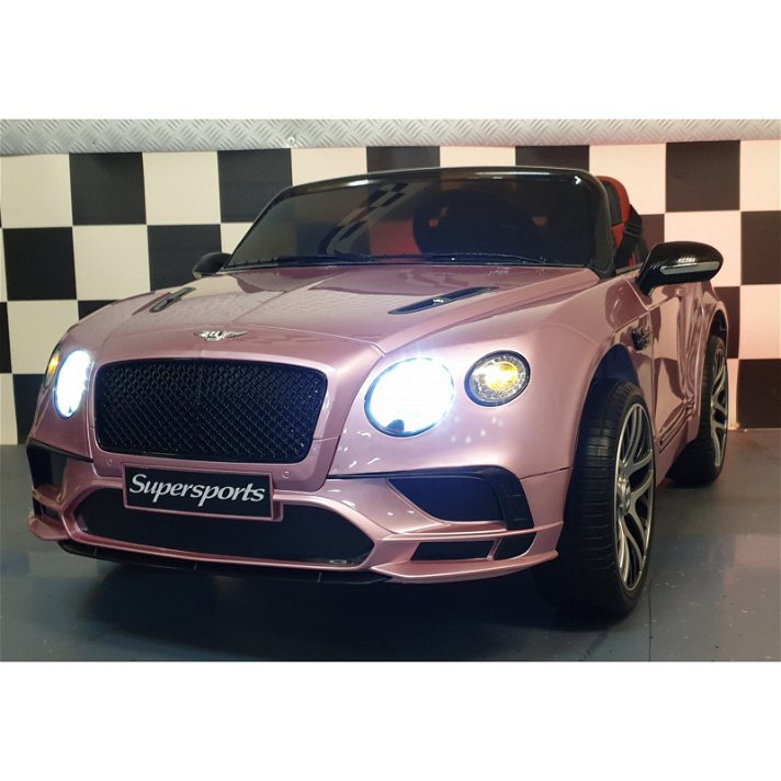 Coche eléctrico de color rosa metalizado Bentley Continental en plástico Cars4Kids